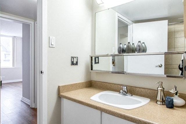 Macdonald Estates in Edmonton, AB bathroom with large mirror