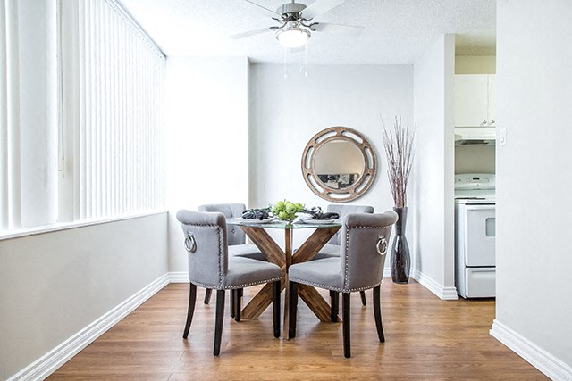 Macdonald Estates in Edmonton, AB bright dining room beside ktichen