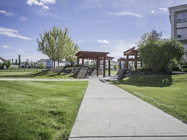 Wellington Court paved path to gazebo in Edmonton, AB