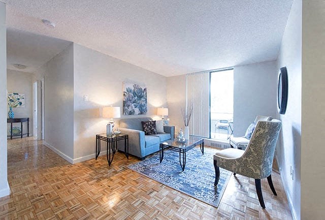 Cedarwoods bright, contemporary living room with access to balcony in Kitchener, ON