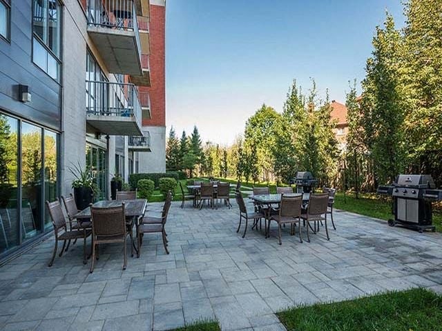 Excelsior Apartments outdoor terrace with BBQs in Montreal, QC