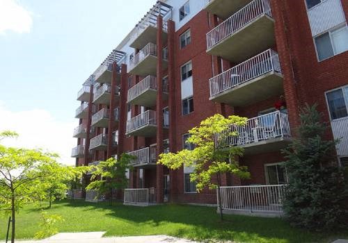 Bourg Du Village Exterior highlighting contemporary design and nature in Sainte Therese, QC