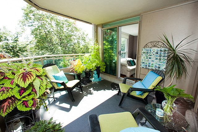 Brookbanks Nature inspired balcony surrounded by lush plant life in Toronto, ON