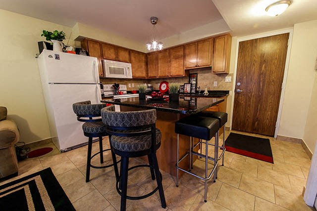 Garden Court in Windsor, ON kitchen with large breakfast island