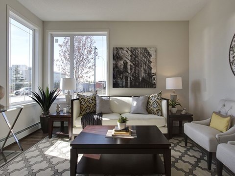Airdrie Place in Airdrie, AB Generous size living room with ample natural lighting