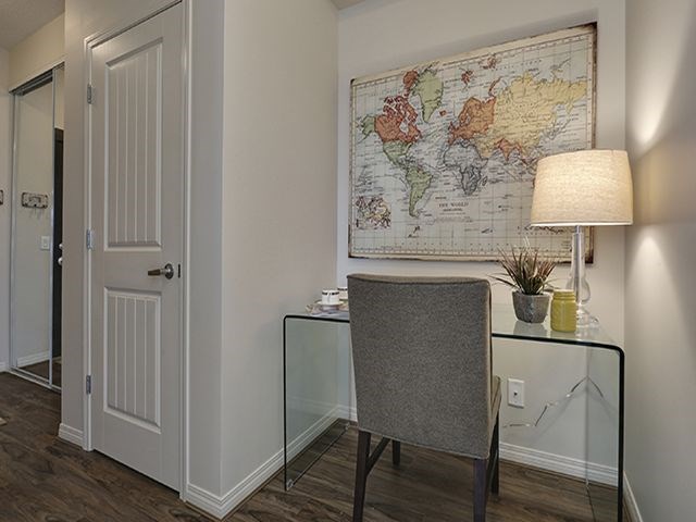 Airdrie Place in Airdrie, AB Open concept study area with closet and storage