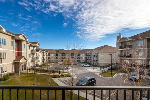Beacon Heights in Calgary, AB view from balcony facing parking lot