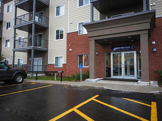 Elizabeth Gardens in Edmonton, AB exterior entrance and parking lot