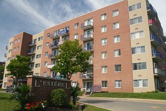 L'Esterel in Pointe-Claire, QC exterior with building sign