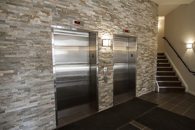 Rittenhouse in Kitchener, ON lobby with two elevators and stairs