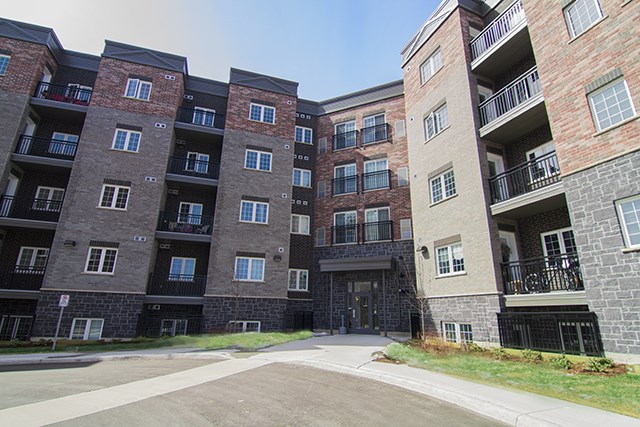 Rittenhouse in Kitchener, ON exterior of building and parking lot