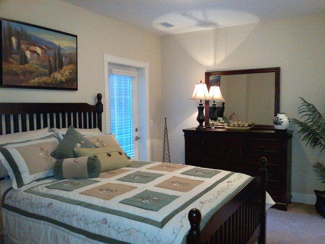 The Conservatory cozy bedroom in Kelowna, BC