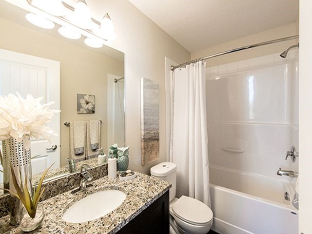 Giroux Estates in St. Albert, AB bathroom with full sized bathtub