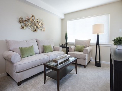 a living room with a couch and a coffee table