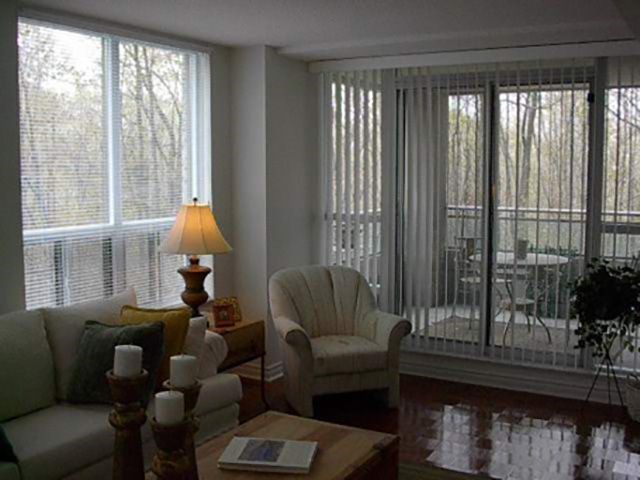 a living room with a couch and a chair