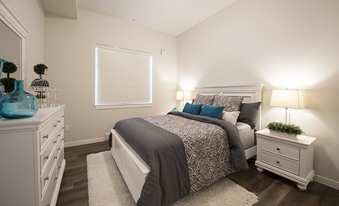 Summerhill Village apartments bedroom featuring luxury vinyl flooring in Nanaimo, BC