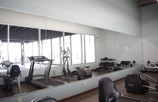 Enjoy healthy living in available fitness rooms Gyms available for maintaining health and athleticism at 99 Jasper in Edmonton, AB