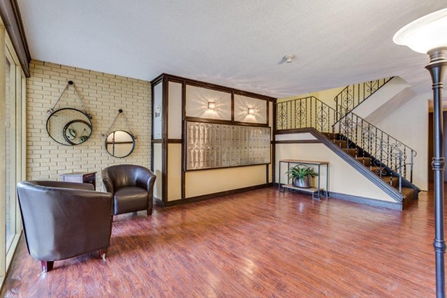 Shoreview in North Vancouver, BC Lobby with leather chairs next to each other and stairs