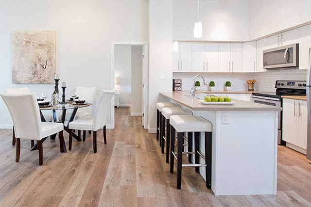 Summerhill Place in Nanaimo, BC kitchen and dining room with luxury vinyl flooring
