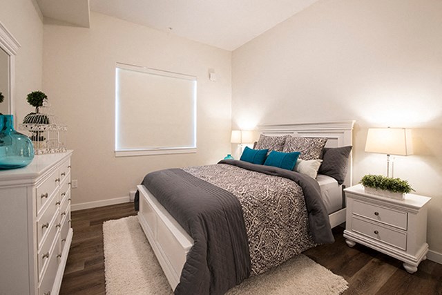 Summerhill Place in Nanaimo, BC bedroom with window and window coverings