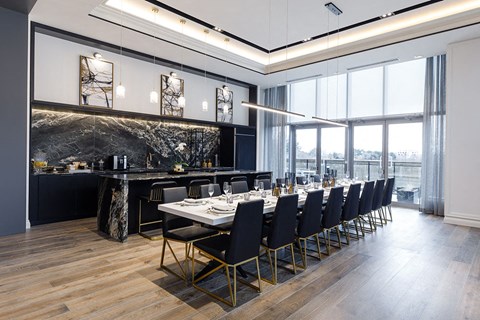 The Taunton Apartments dining lounge featuring catering kitchen in Oakville, ON