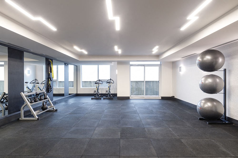 The Taunton Apartments fully equipped fitness facility featuring large open space in Oakville, ON