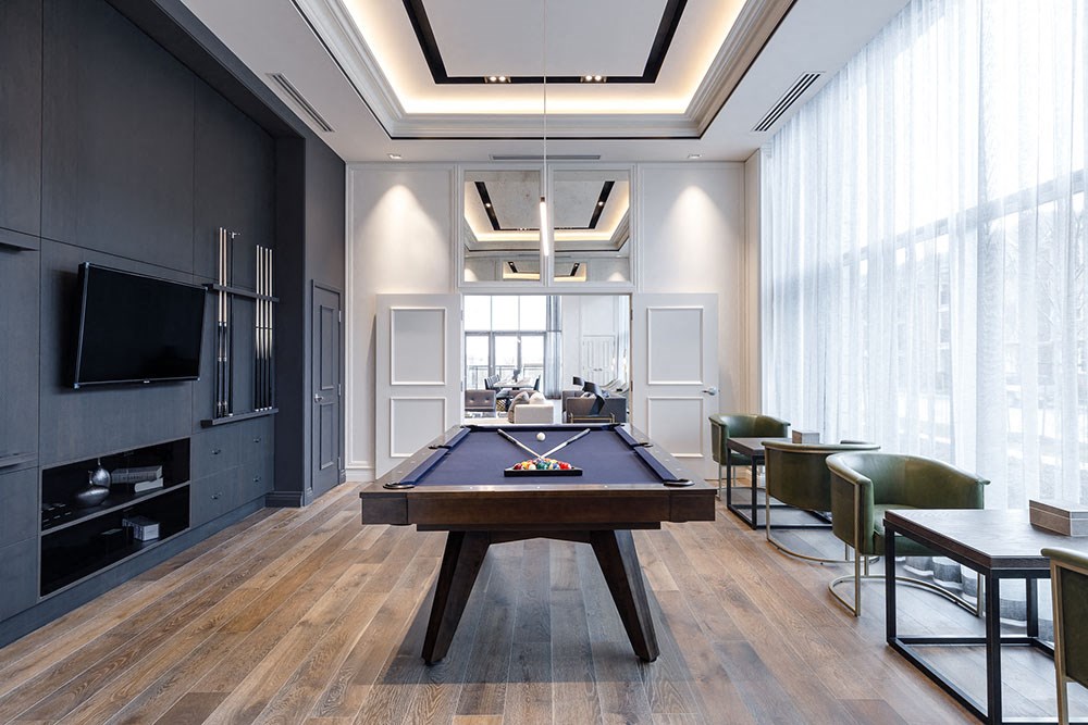 The Taunton Apartments billiards room featuring flat screen TV and pool table in Oakville, ON