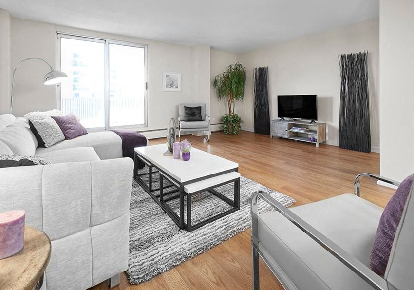 Panorama Apartments in Edmonton, AB spacious living room with access to balcony - Photo Gallery