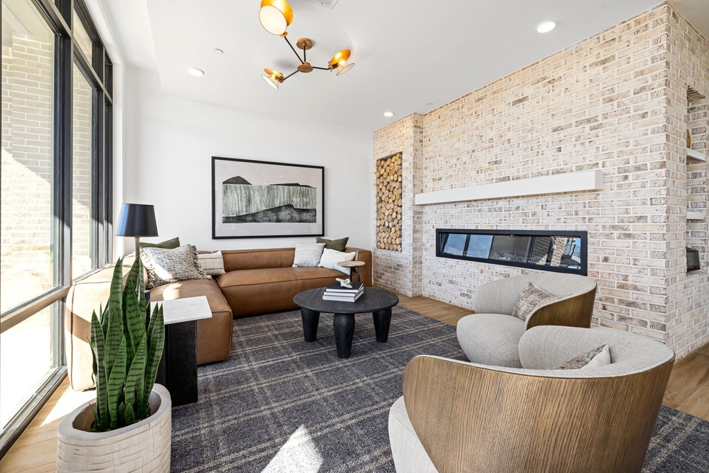 A living room with a fireplace and a couch.