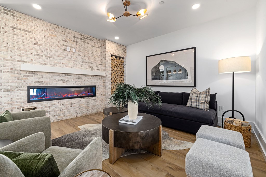 A living room with a fireplace and a couch.