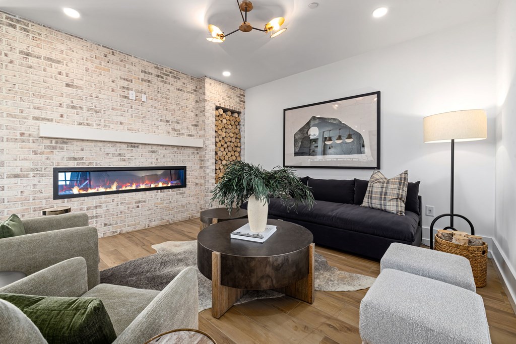 A living room with a fireplace and a couch.