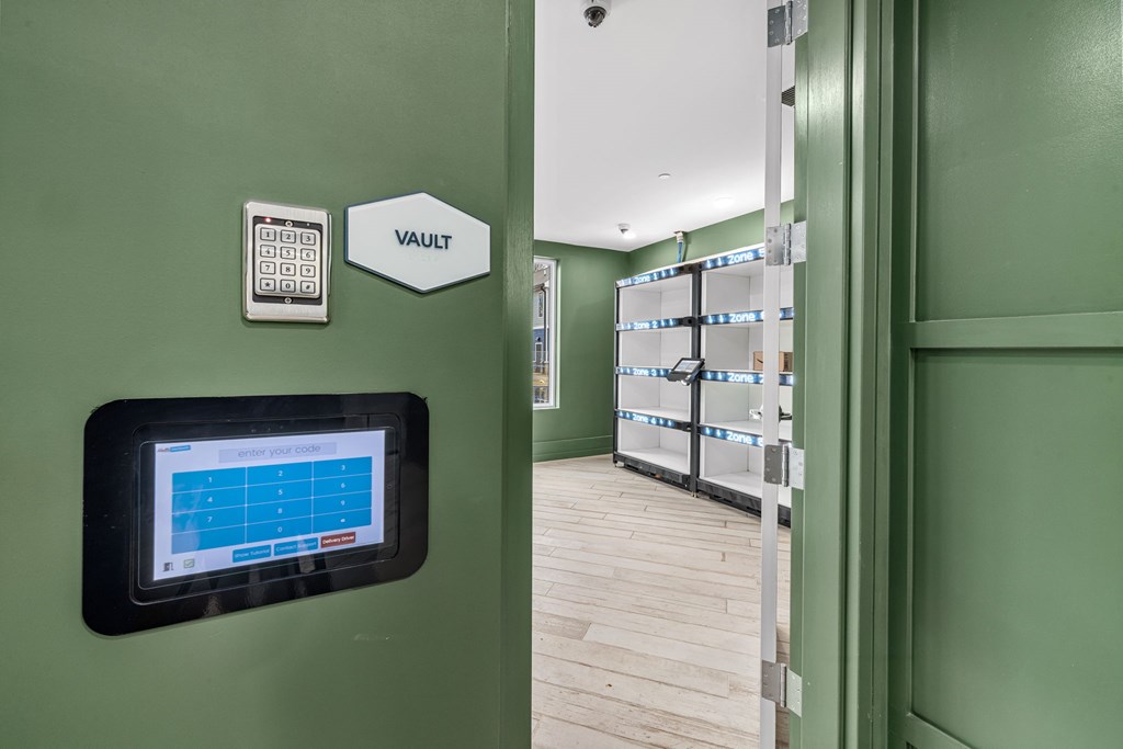 A vault room with a digital screen showing a calendar.