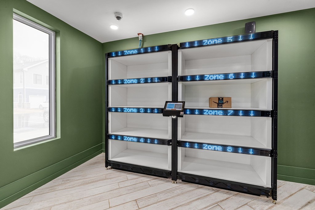 A wall of shelves with digital displays showing zone numbers.