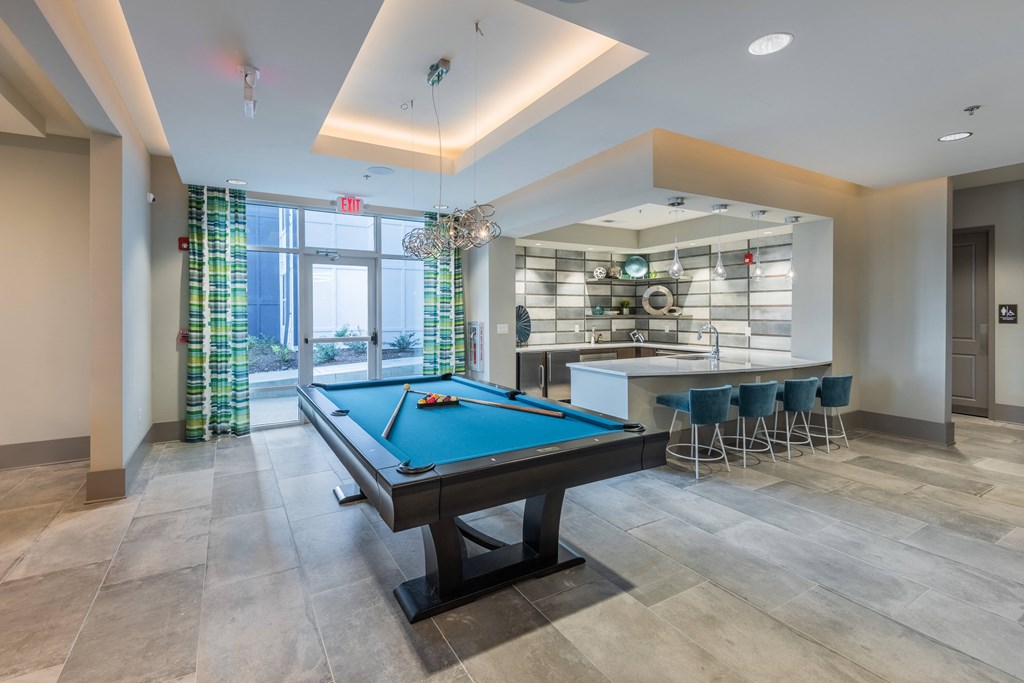 play a game of pool in our clubhouse atrium
