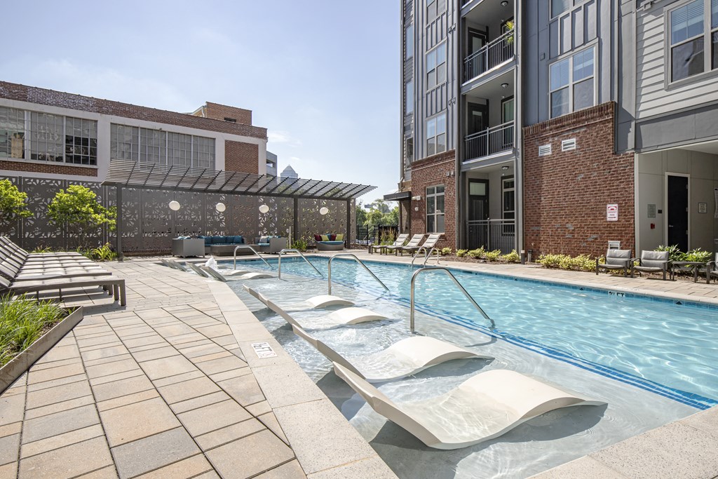 pool with aquatic chairs