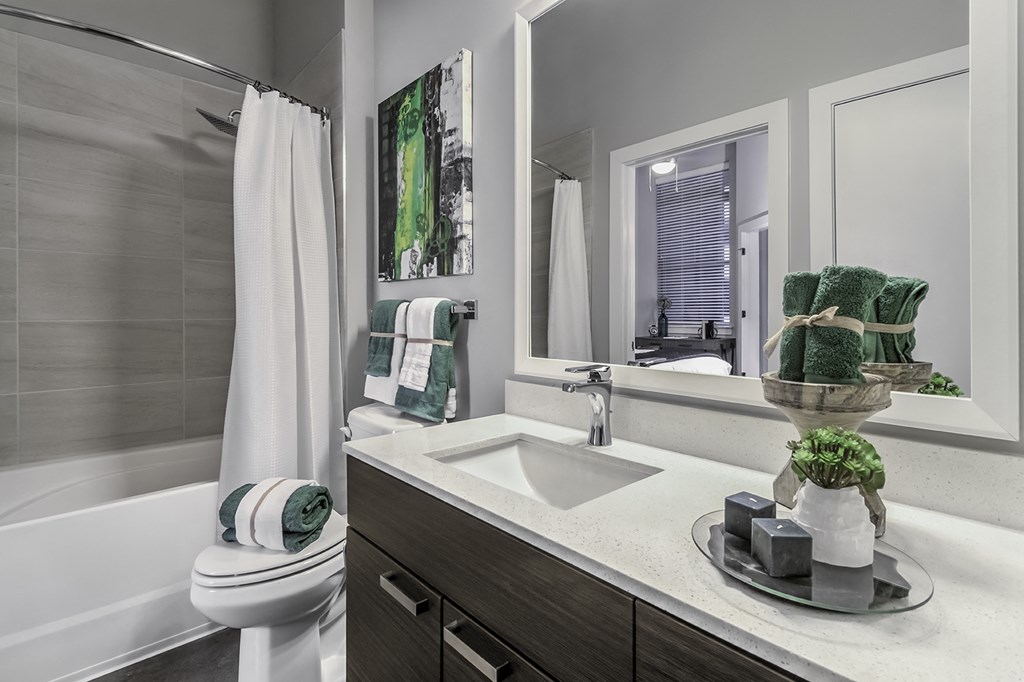 bathroom with quartz countertops
