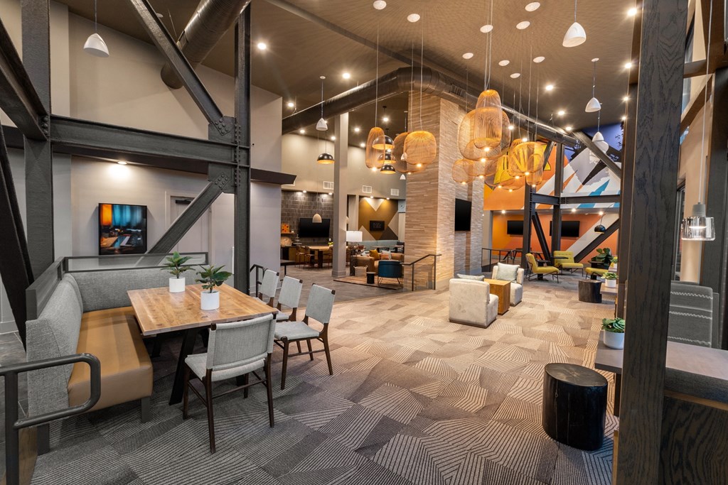 a rendering of the lobby of a restaurant with tables and chairs