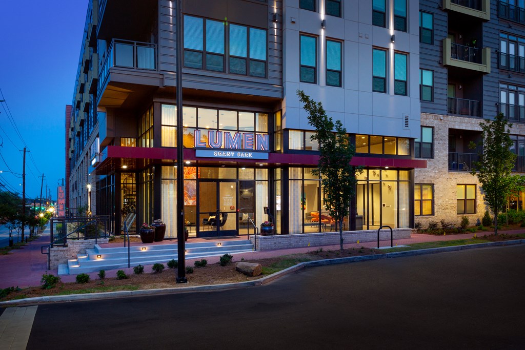 a view of the entrance to a building at night