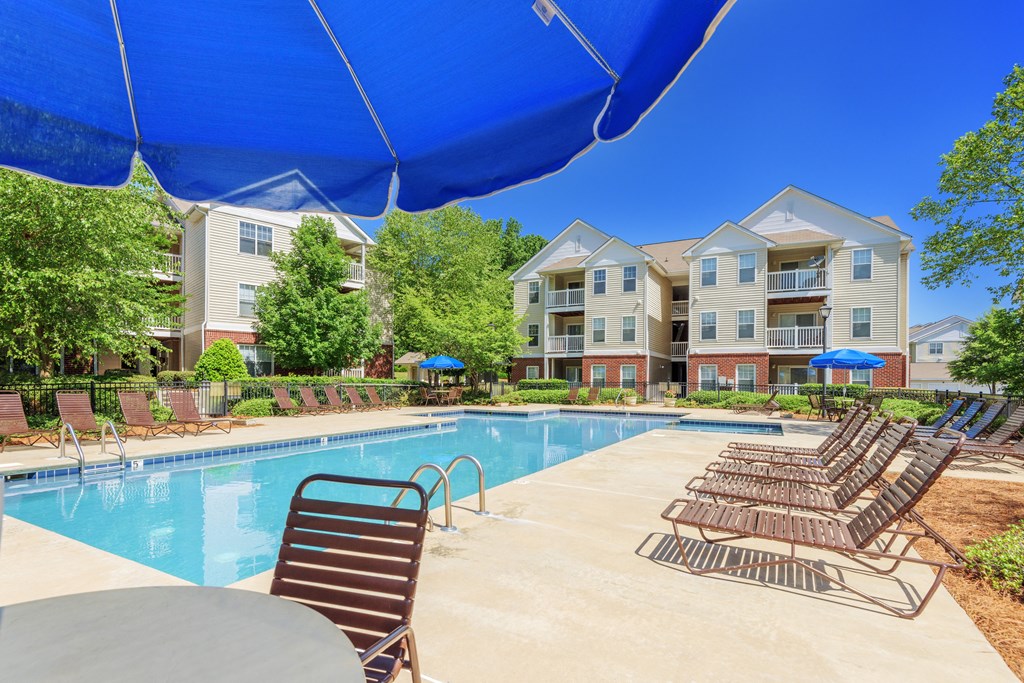 swimming pool with pool chairs