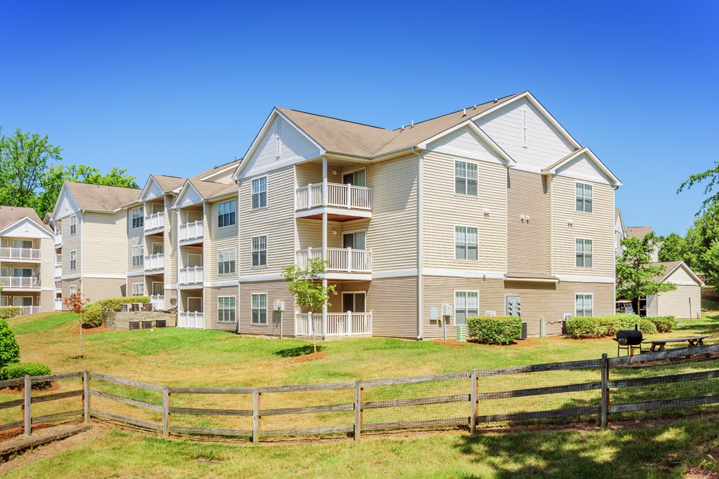 building with wooden fence