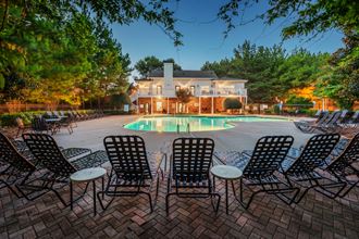 evening pool exterior and clubhouse