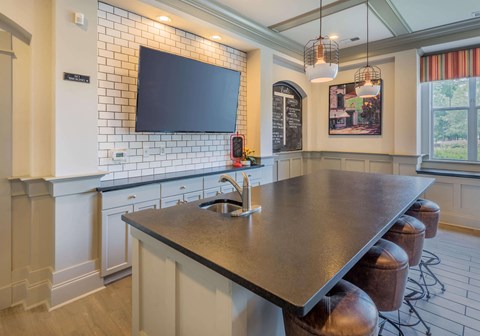 a kitchen with a large counter top and a sink