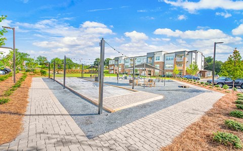 Community green and game area bocce ball court