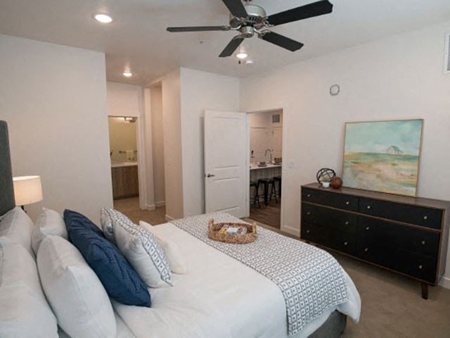 Gorgeous Primary Bedroom with Ceiling Fan at Foothill Lofts Apartments & Townhomes, Logan