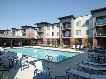 Swimming Pool And Sundeck at Foothill Lofts Apartments & Townhomes, Logan, 84341 - Photo Gallery 24