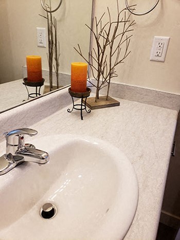 Renovated Bathrooms With Quartz Counters at Foothill Lofts Apartments & Townhomes, Logan, Utah - Photo Gallery 22