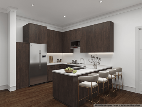 A modern kitchen with dark wood cabinets and stainless steel appliances.