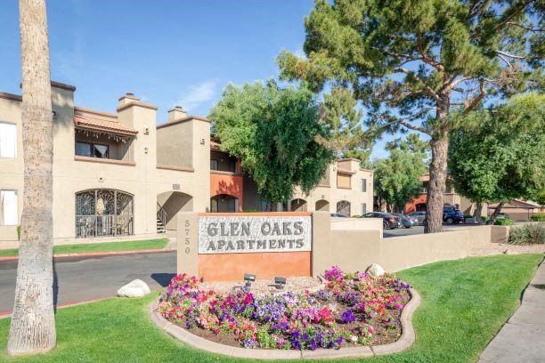Welcome to Glen Oaks Apartments Property Signage with Flowers in  Glendale, 85301