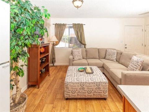 a living room with a couch and a coffee table