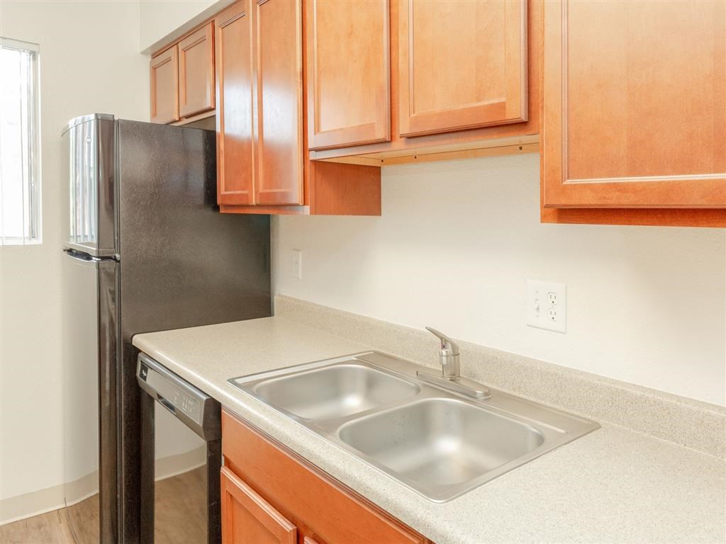 Stainless Steel Sink With Faucet In Kitchen at Cimarron Place Apartments, Tucson, AZ